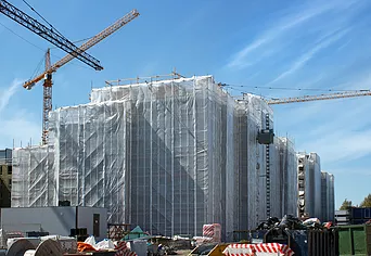 Scaffolding protected with a plastic she